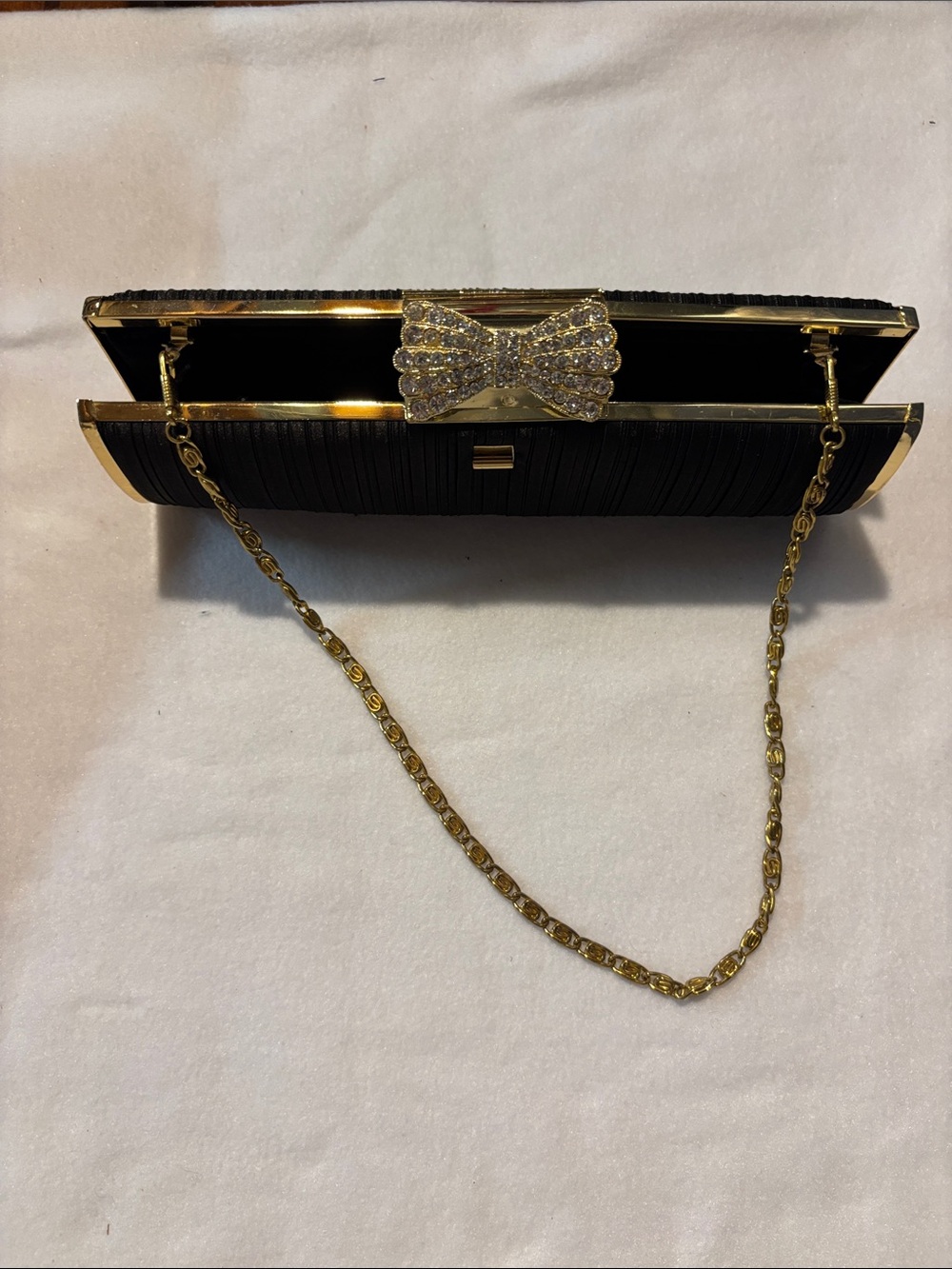 Black Evening Clutch with Gold Chain and Bow Accent